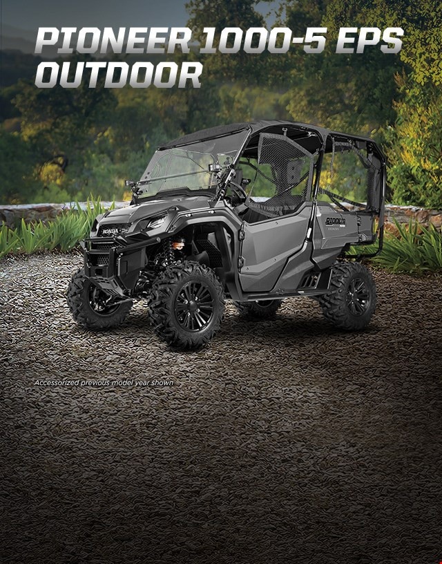 Pioneer 1000-5 EPS Outdoor. Go beyond extraordinary. Rugged 5-person side-by-side with fabric roof and windshield overlooking lush green vista 