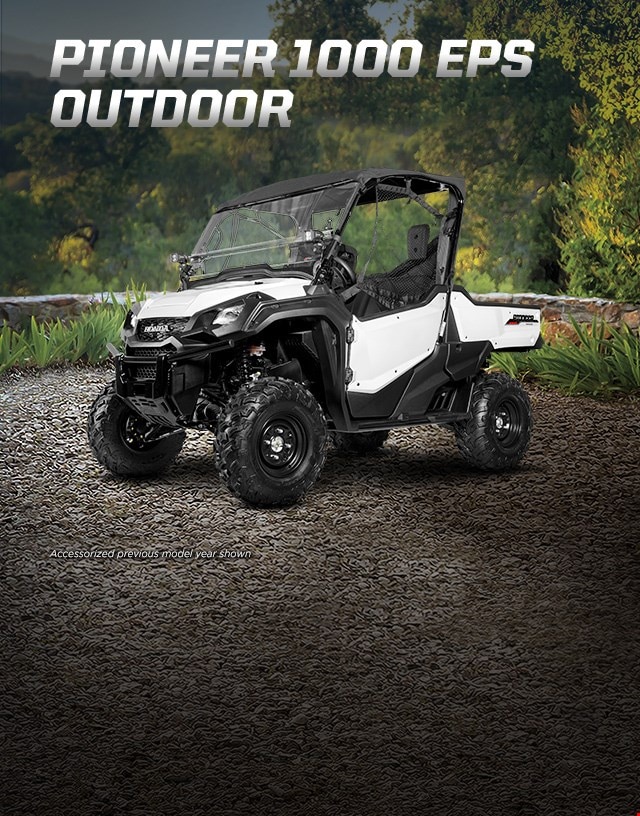 Pioneer 1000 EPS Outdoor. Go beyond extraordinary. Rugged side-by-side with fabric roof and windshield overlooking lush green vista 