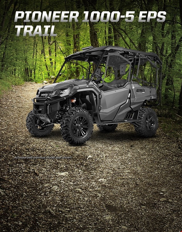 Pioneer 1000-5 EPS Trail. Go beyond extraordinary. Black 5-person side-by-side with hard roof and mounted LED light bar ready to explore deep forested trail