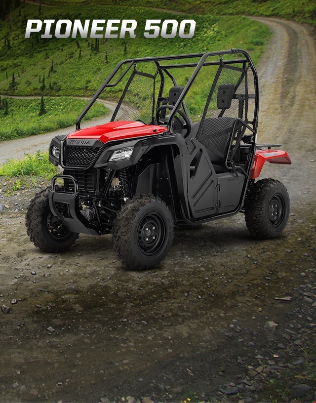 Pioneer 500. Adventures anywhere. Image of compact side-by-side speeding through rocky, muddy creek in the forest
