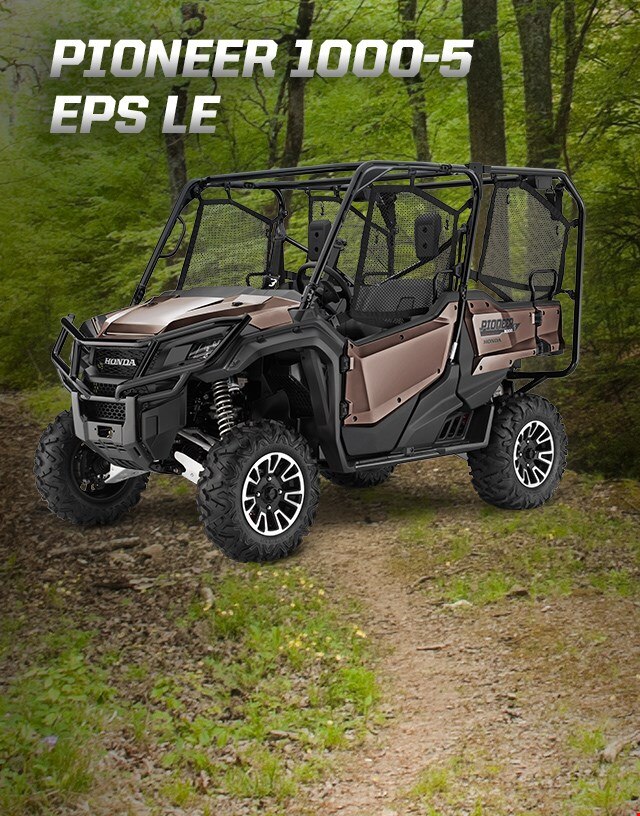 Pioneer 1000-5 EPS LE. Defy boundaries. People in a Pioneer in the wilderness.