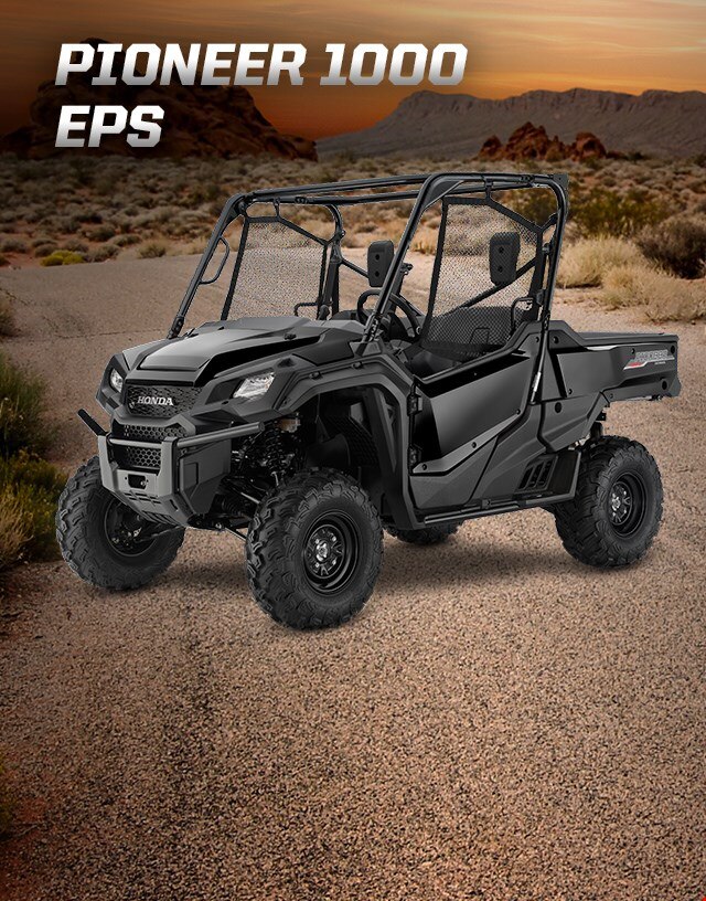 Pioneer 1000 EPS. Go beyond extraordinary. Image of a striking red side-by-side parked on wild off-road terrain among blue skies and snow capped mountain peaks
