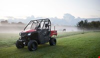 Front view of Pioneer 520 in front of grassy field
