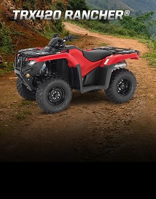 "Honda's line of ATVs has earned a solid and well-deserved reputation for being some of the most durable ATVs on the planet" - quote by Outdoorlife.com. Image of rider in denim shirt driving through thick muddy trail in the forest.