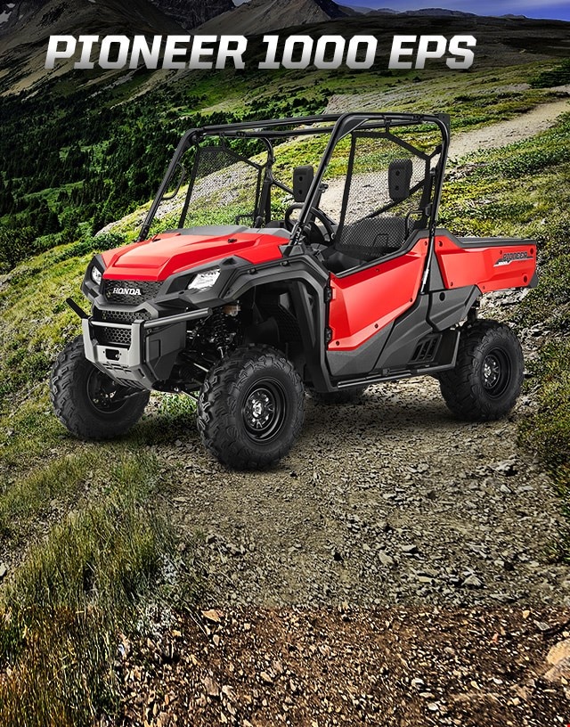 Pioneer 1000 EPS. Go beyond extraordinary. Image of a striking red side-by-side parked on wild off-road terrain among blue skies and snow capped mountain peaks