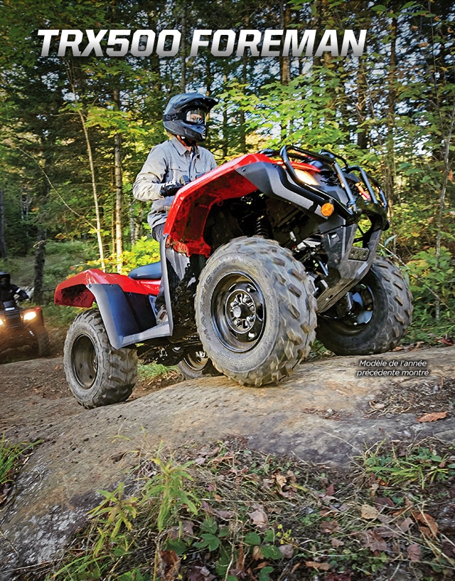 TRX500 Foreman. Tough to beat. Easy to ride. Image of tough ATV rider driving up rugged terrain with a trail of dust behind.