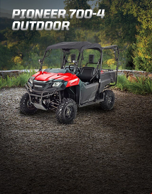 Pioneer 700-4 outdoor. Haul more, go further. Image of ATV in garden.