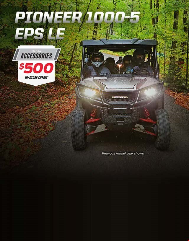 Pioneer 1000-5 EPS LE. Defy boundaries. People in a Pioneer in the wilderness.